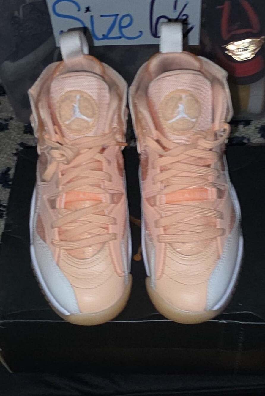 women's Air Jordan Jumpman Two Trey sneakers in the "Arctic Orange" colorway. Si